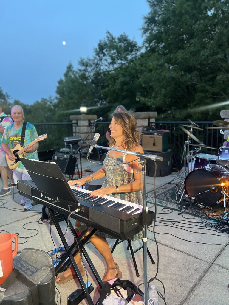 Becky and the Beasts band playing on stage